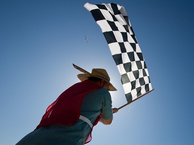 race, aircraft, sky, clouds, airplane-race, flag, checkered, finish, line, outside, man, close-up, nature, blue plane, blue airplane, blue closed